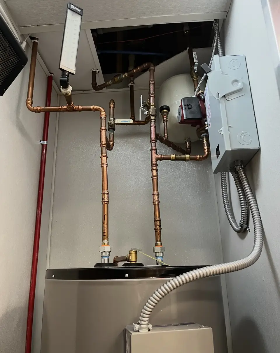 Copper manifold and gas line on a new water heater install